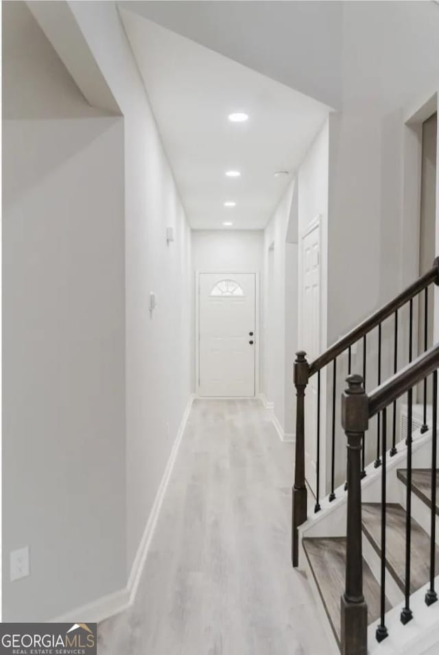 corridor featuring light hardwood / wood-style flooring