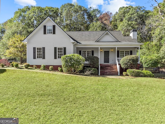 view of front of property featuring a porch and a front yard