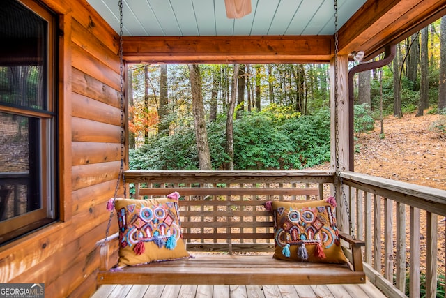 exterior space with wood ceiling