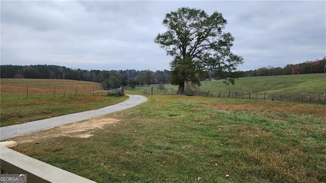 exterior space with a rural view