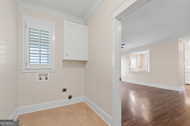 laundry area featuring hookup for a washing machine, light hardwood / wood-style flooring, electric dryer hookup, and crown molding