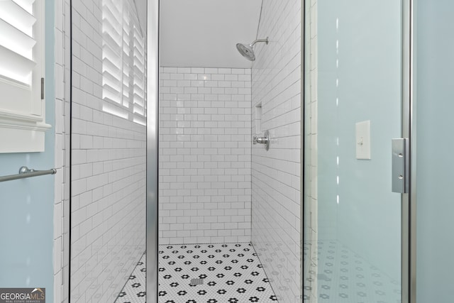 bathroom featuring walk in shower