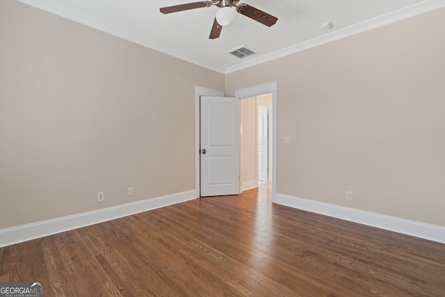 unfurnished room with ceiling fan, ornamental molding, and hardwood / wood-style flooring