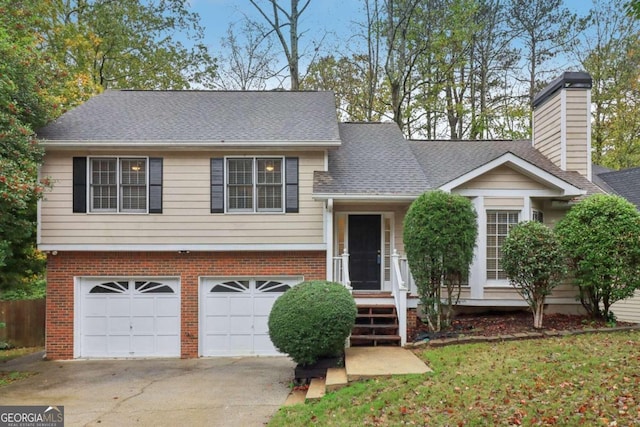 split level home with a garage