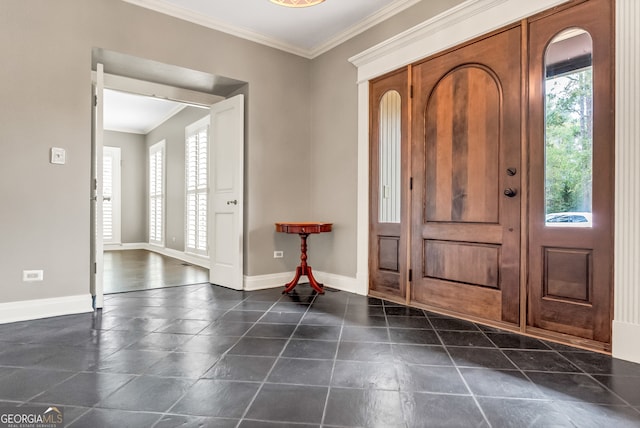 foyer featuring ornamental molding