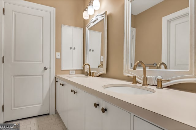 bathroom with vanity and tile patterned floors