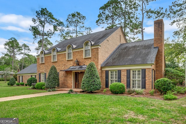 view of front of house with a front yard