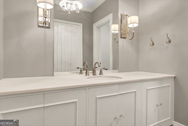 bathroom with vanity and ornamental molding