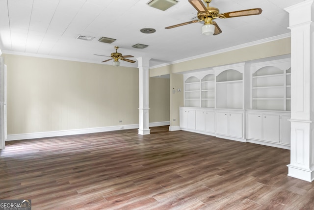 unfurnished room featuring dark hardwood / wood-style flooring, decorative columns, ornamental molding, ceiling fan, and built in features