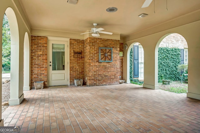 view of patio / terrace featuring ceiling fan