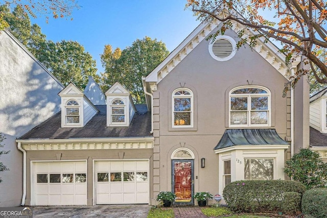 front of property with a garage