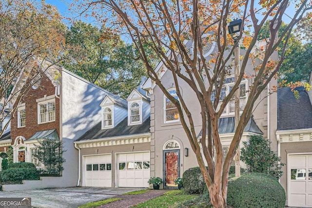 view of front of property featuring a garage