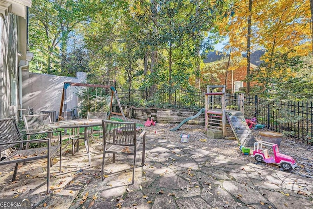 view of patio / terrace featuring a playground