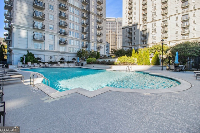 view of pool with a patio area