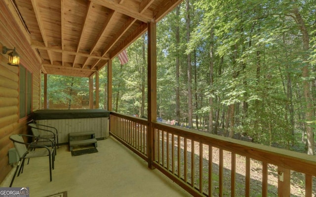 unfurnished sunroom featuring wood ceiling