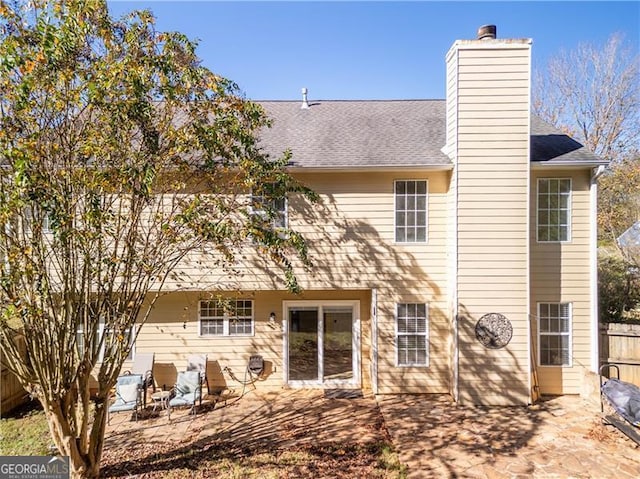 rear view of house featuring a patio