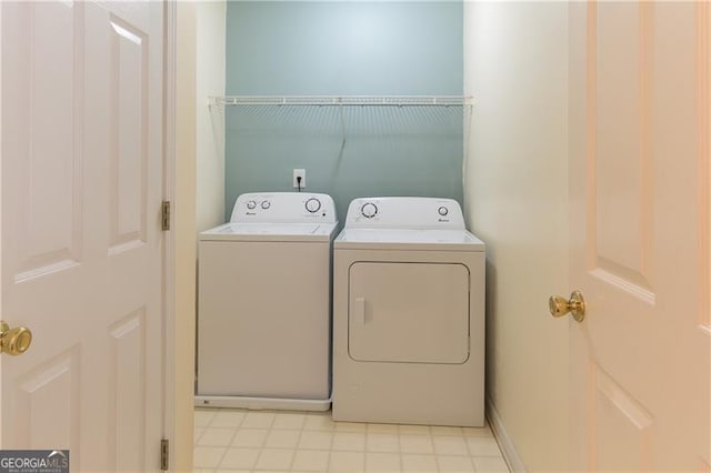 washroom with washer and clothes dryer