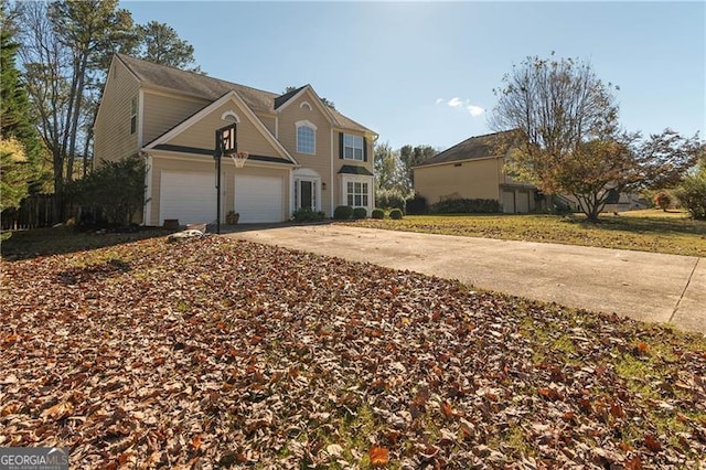 view of property with a garage