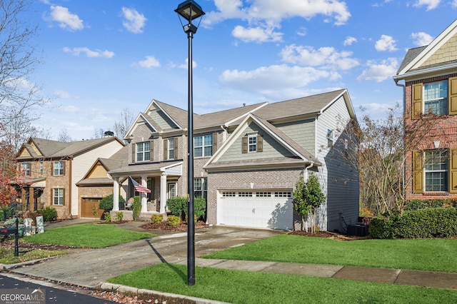 view of front of house featuring a garage and a front yard