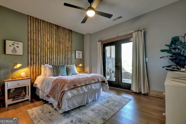 bedroom with ceiling fan, light hardwood / wood-style floors, access to outside, and french doors