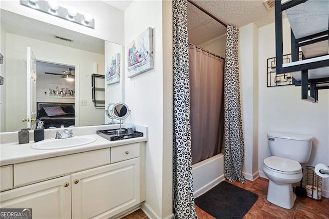 full bathroom with vanity, ceiling fan, toilet, and shower / tub combo with curtain