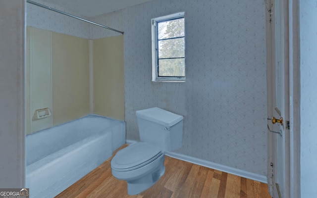 bathroom featuring toilet and hardwood / wood-style floors