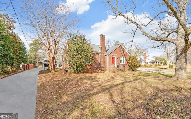 exterior space with a front lawn