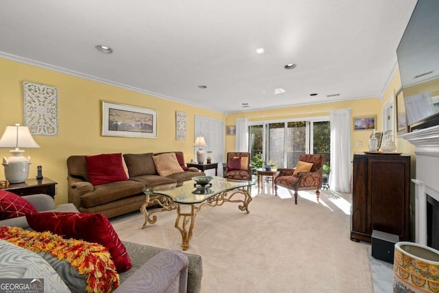 carpeted living room with ornamental molding