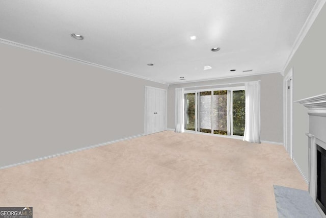 unfurnished living room featuring light colored carpet and crown molding