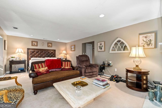 bedroom featuring light carpet