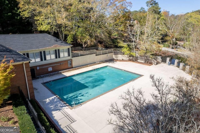 view of pool featuring a patio area