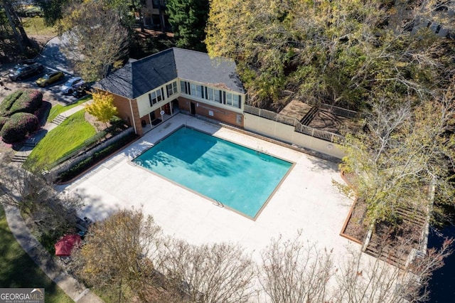 view of swimming pool with a patio