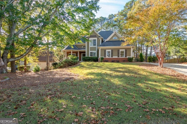 view of front of home with a front lawn