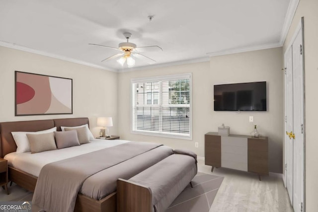 bedroom with ceiling fan and ornamental molding