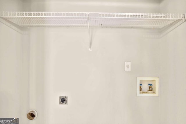 laundry area featuring hookup for a washing machine, hookup for a gas dryer, and electric dryer hookup