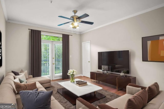 living room with french doors, ceiling fan, crown molding, and wood-type flooring