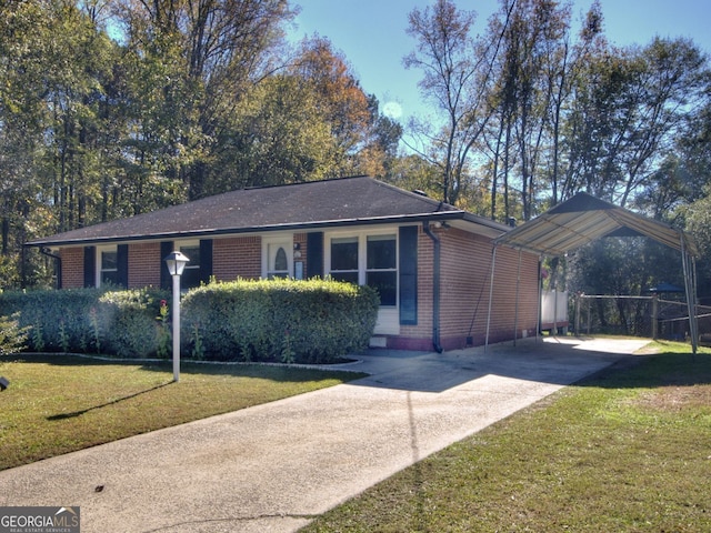 single story home featuring a carport and a front lawn