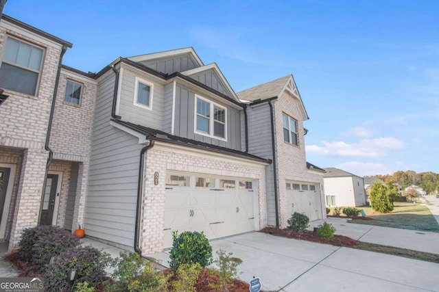 view of front of home with a garage