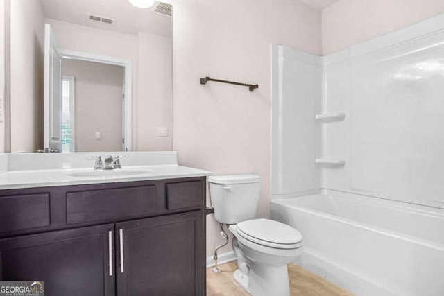 full bathroom featuring tile patterned flooring, vanity, toilet, and washtub / shower combination