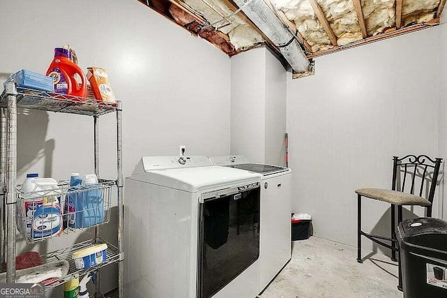 laundry room with washer and clothes dryer