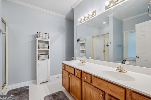 bathroom featuring a shower with door, vanity, and ornamental molding