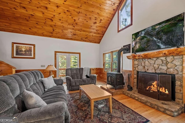 living room featuring hardwood / wood-style floors, high vaulted ceiling, a healthy amount of sunlight, and wood ceiling