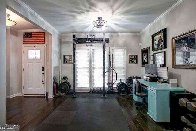 interior space with dark hardwood / wood-style floors, plenty of natural light, and crown molding