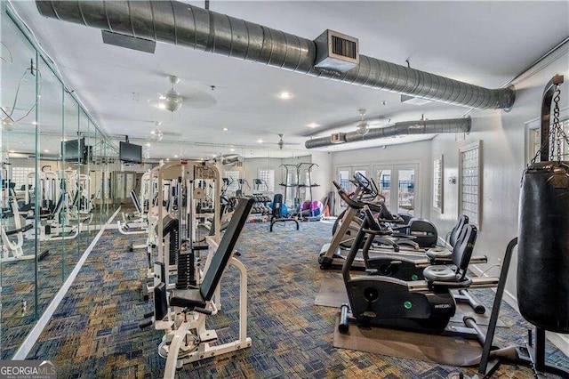 workout area featuring carpet floors and ceiling fan