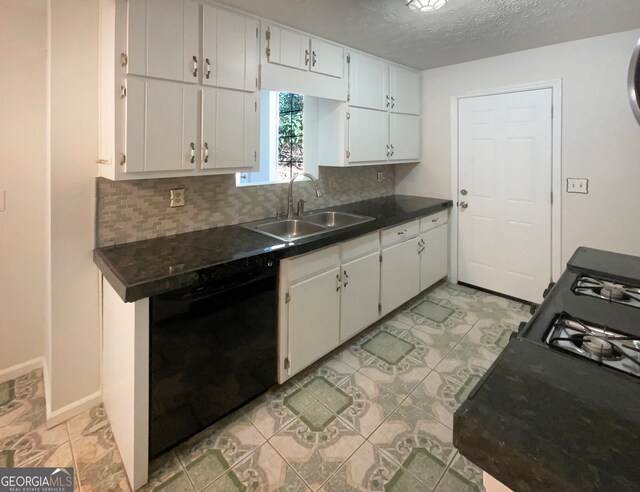 kitchen featuring sink, light tile patterned floors, backsplash, white cabinets, and black appliances