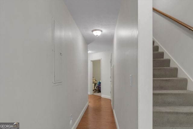 corridor featuring hardwood / wood-style flooring