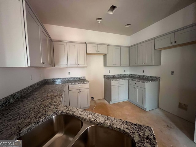 kitchen with dark stone counters