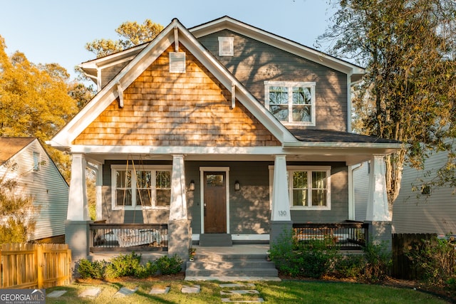 view of front of home featuring covered porch