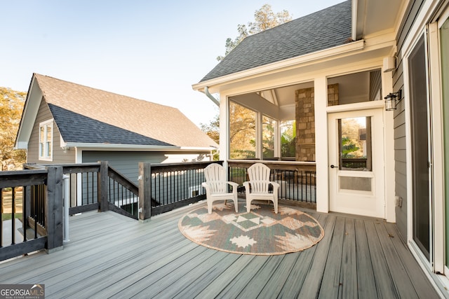 wooden terrace with a sunroom