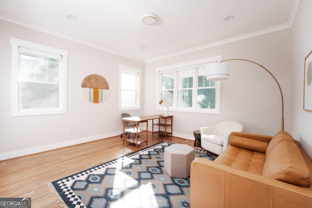 living room with hardwood / wood-style floors and crown molding